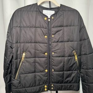 Black jacket with goal accents